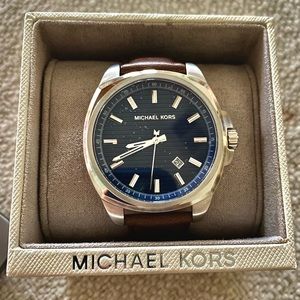 Michael Kors men’s watch. Leather band. Brand new